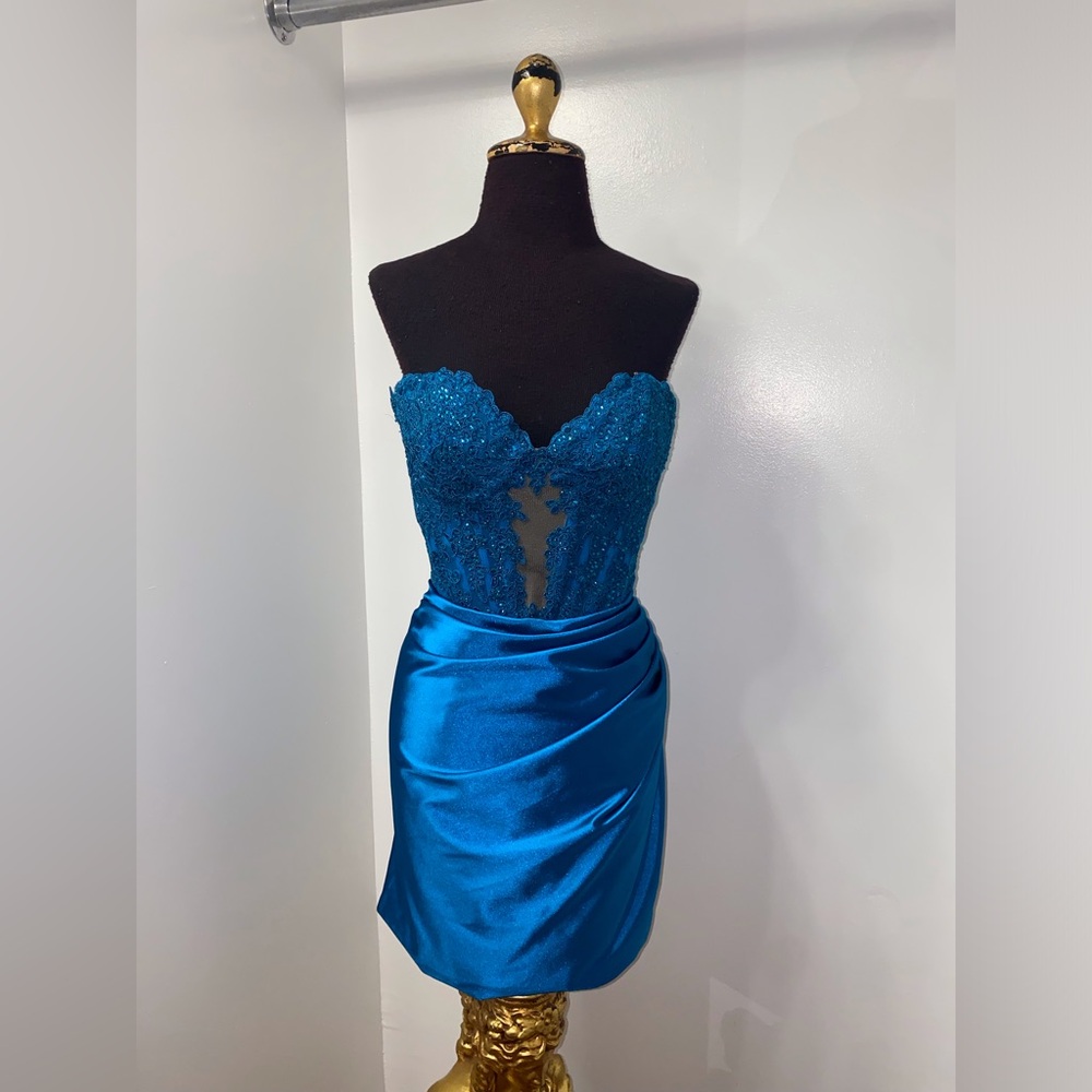 Strapless lace embellished corset fitted gown with keyhole
